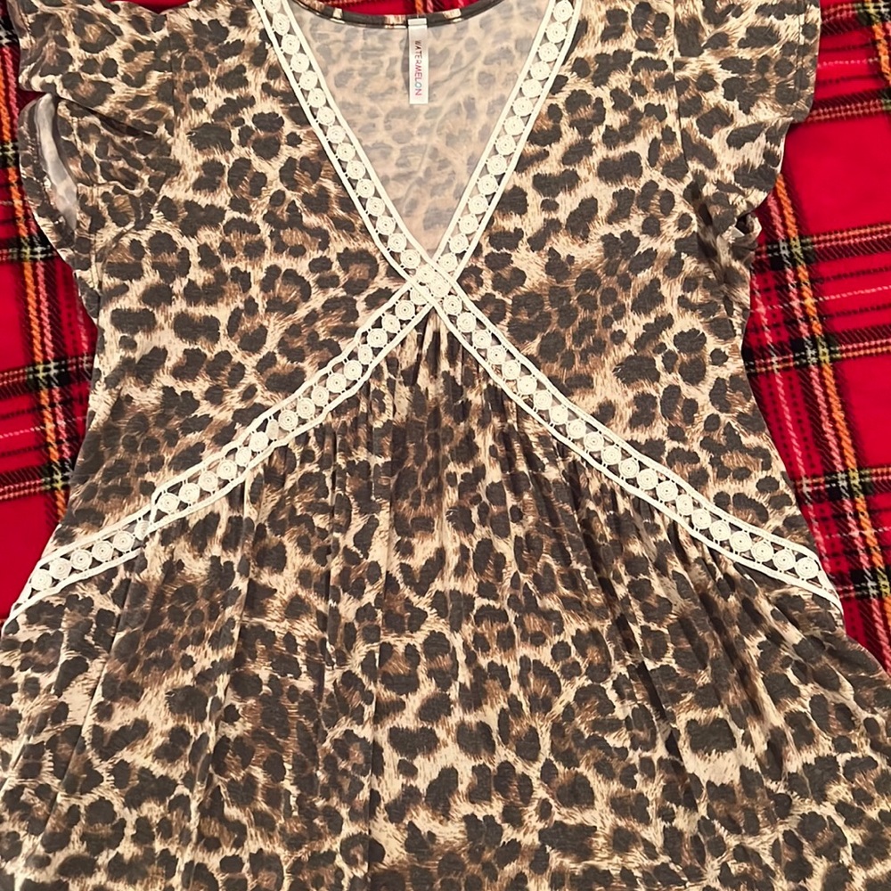 Beautiful leopard top with embroidered empire waist